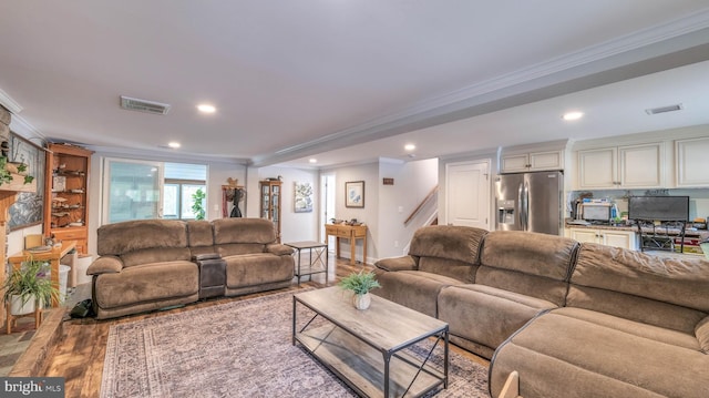 411 Spencer, Galloway, NJ 08205 - living room with ornamental molding, wood finished floors, recessed lighting, baseboards, and stairway