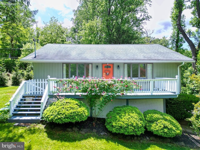 175 Mountain Heights Rd, Front Royal, VA 22630 - view of front facade featuring stairs, roof with shingles, a deck, and a front lawn
