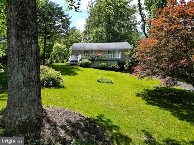 175 Mountain Heights Rd, Front Royal, VA 22630 - view of front of house featuring a front yard, board and batten siding, and a deck