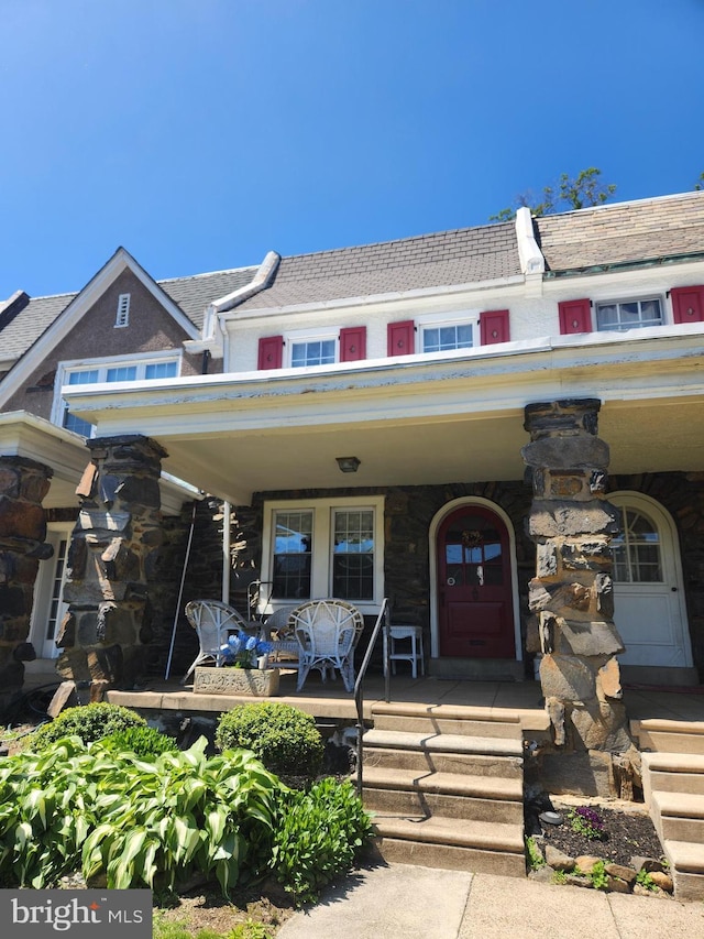 6427 Woodcrest Ave, Philadelphia, PA 19151 - multi unit property featuring a porch and stone siding