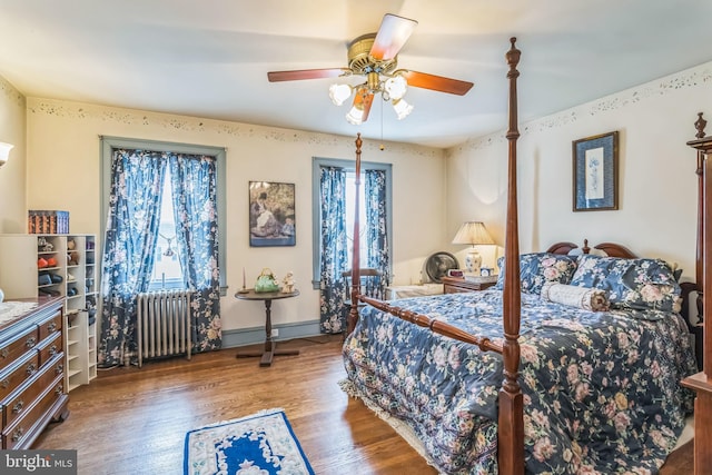 6427 Woodcrest Ave, Philadelphia, PA 19151 - bedroom with radiator, wood finished floors, and a ceiling fan