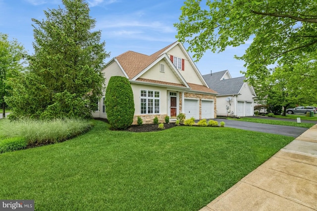 1 Grande Blvd, West Windsor, NJ 08550 - traditional home with stucco siding, an attached garage, a front yard, driveway, and roof with shingles