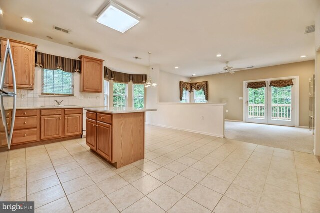 1 Grande Blvd, West Windsor, NJ 08550 - kitchen featuring light countertops, ceiling fan, a sink, healthy amount of natural light, and recessed lighting