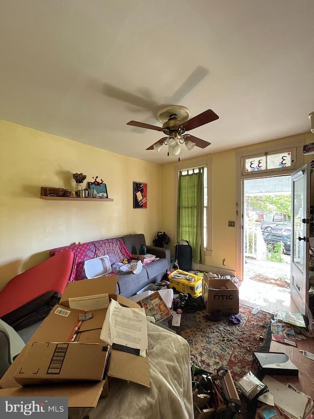 living room with a ceiling fan