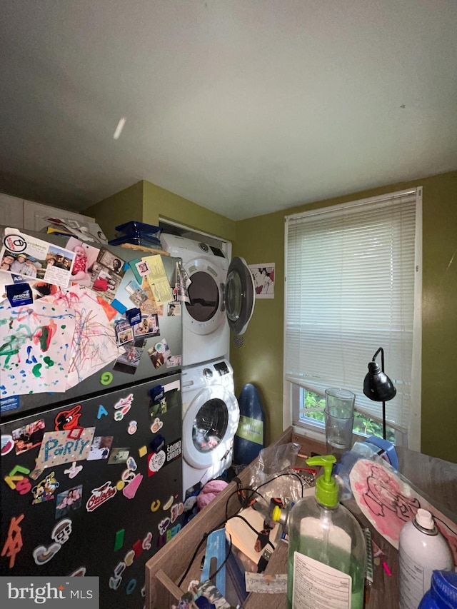 laundry area featuring estacked washer and dryer
