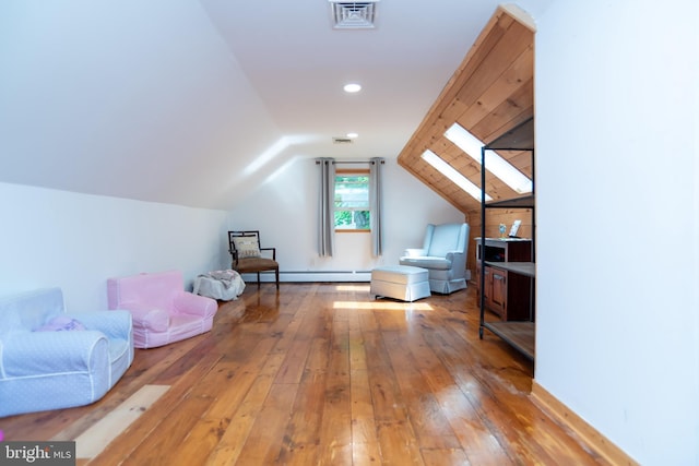 303 N Elm Ave, Newtown, PA 18940 - additional living space featuring a baseboard radiator, wood-type flooring, and lofted ceiling