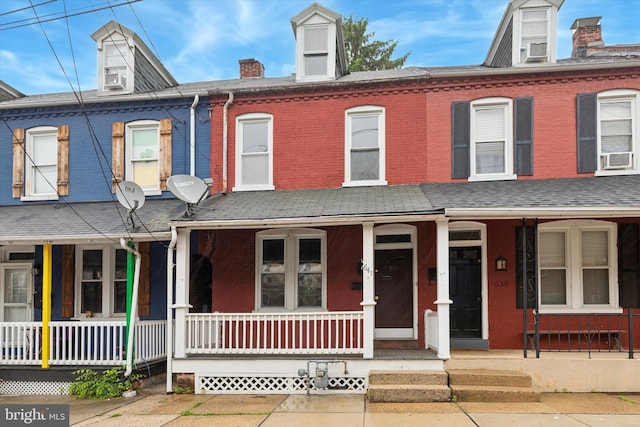641 N Mary St, Lancaster, PA 17603 - townhome / multi-family property with a porch, brick siding, and cooling unit