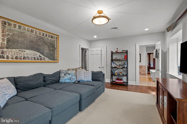 1182 Wrack Rd, Meadowbrook, PA 19046 - living area with dark wood-style floors, recessed lighting, and baseboards