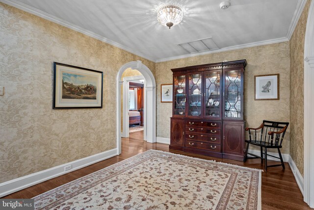 1182 Wrack Rd, Meadowbrook, PA 19046 - entryway featuring arched walkways, wood finished floors, ornamental molding, wallpapered walls, and baseboards