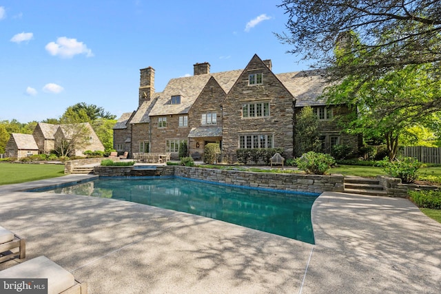 1182 Wrack Rd, Meadowbrook, PA 19046 - outdoor pool featuring a hot tub and a patio area