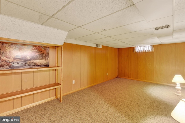 374 E Maple St, Dallastown, PA 17313 - finished basement featuring a paneled ceiling, carpet flooring, and wood walls