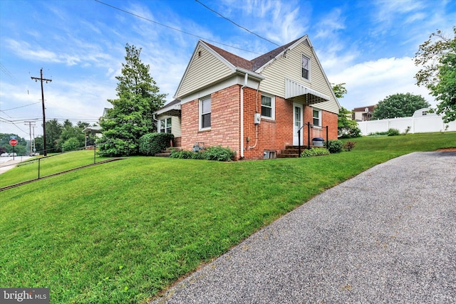 374 E Maple St, Dallastown, PA 17313 - view of side of home with brick siding