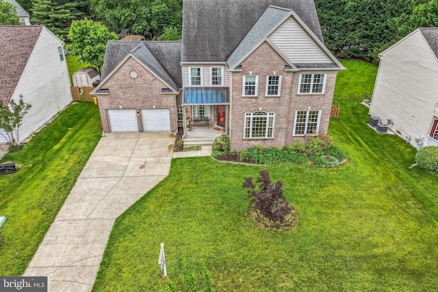 911 Echo Bay Ct, Gambrills, MD 21054 - view of front facade featuring brick siding, concrete driveway, a garage, and a front lawn