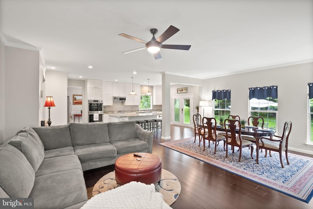 20355 Snowpoint Pl, Ashburn, VA 20147 - living area featuring ceiling fan, dark wood finished floors, ornamental molding, baseboards, and recessed lighting