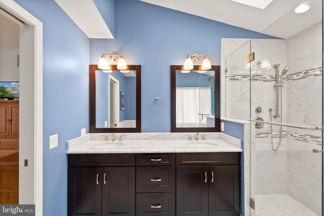 20355 Snowpoint Pl, Ashburn, VA 20147 - bathroom with double vanity, a stall shower, and lofted ceiling