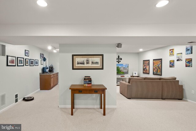 20355 Snowpoint Pl, Ashburn, VA 20147 - living room featuring light carpet, recessed lighting, and baseboards