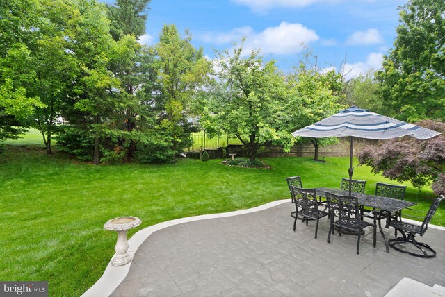 20355 Snowpoint Pl, Ashburn, VA 20147 - view of patio / terrace with outdoor dining area