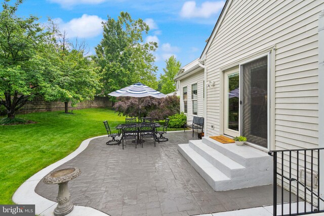 20355 Snowpoint Pl, Ashburn, VA 20147 - view of patio featuring entry steps and outdoor dining space