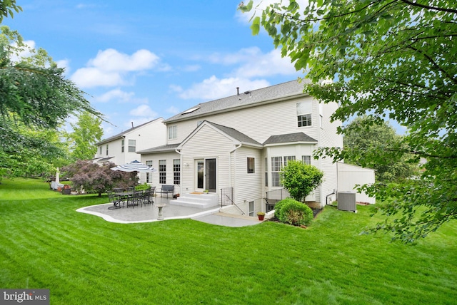 20355 Snowpoint Pl, Ashburn, VA 20147 - back of house with a patio, a lawn, central AC, and entry steps