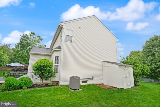 20355 Snowpoint Pl, Ashburn, VA 20147 - view of home's exterior featuring central air condition unit and a yard