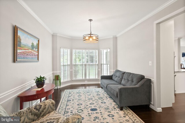 20355 Snowpoint Pl, Ashburn, VA 20147 - living area featuring crown molding, dark wood-type flooring, a chandelier, and baseboards
