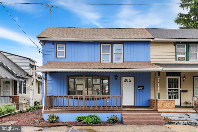 134 S Market St, New Cumberland, PA 17070 - view of front of house featuring covered porch and a shingled roof