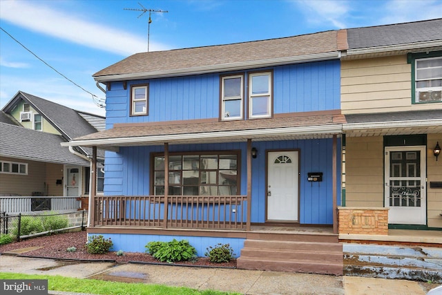 134 S Market St, New Cumberland, PA 17070 - view of front of house with covered porch and roof with shingles