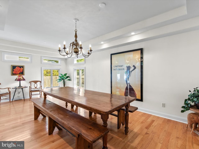37 Sussex St, Rehoboth Beach, DE 19971 - dining area with a chandelier, light wood-style flooring, baseboards, recessed lighting, and a raised ceiling