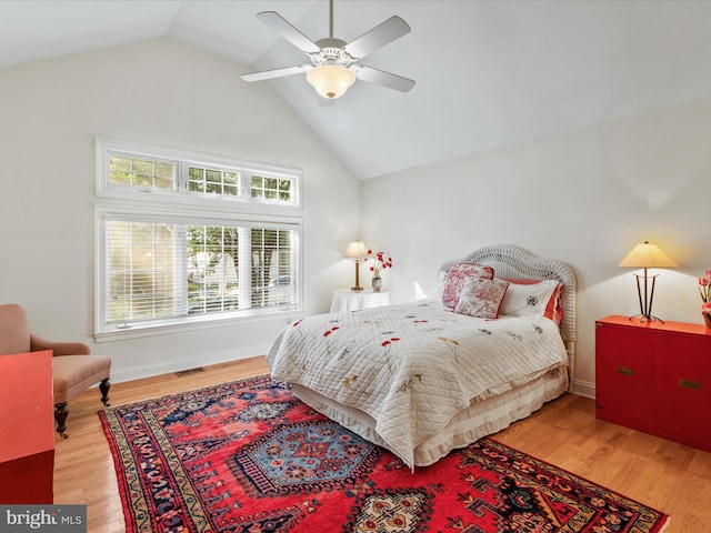 37 Sussex St, Rehoboth Beach, DE 19971 - bedroom with wood finished floors, high vaulted ceiling, and ceiling fan