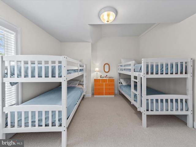 37 Sussex St, Rehoboth Beach, DE 19971 - carpeted bedroom featuring lofted ceiling