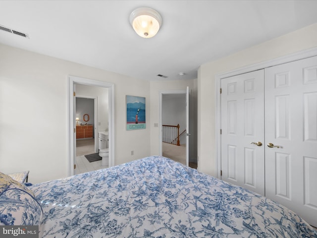 37 Sussex St, Rehoboth Beach, DE 19971 - bedroom featuring a closet, carpet, and ensuite bathroom