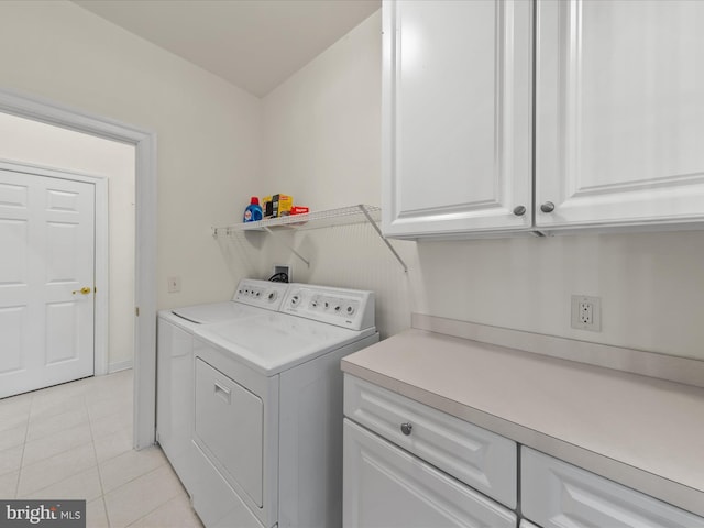 37 Sussex St, Rehoboth Beach, DE 19971 - washroom with washer and clothes dryer, cabinet space, and light tile patterned floors