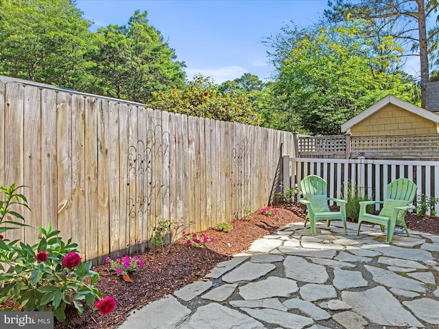 37 Sussex St, Rehoboth Beach, DE 19971 - fenced backyard with a patio