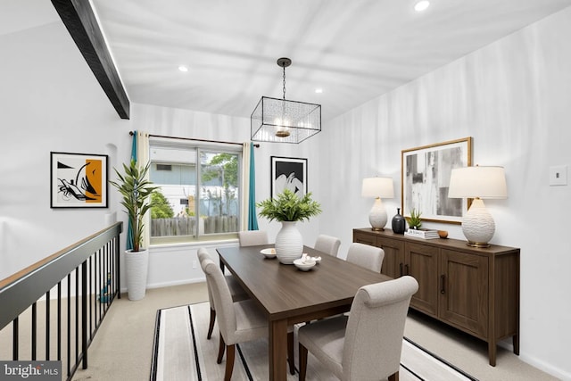 dining room featuring a chandelier, light colored carpet, recessed lighting, and baseboards