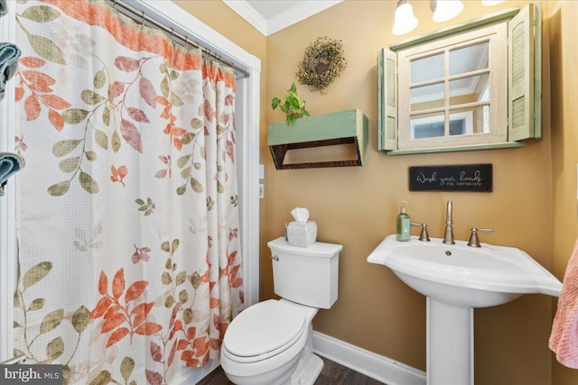 501 Macmillan Ct, Arnold, MD 21012 - bathroom with crown molding, toilet, baseboards, curtained shower, and wood finished floors