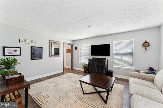 501 Macmillan Ct, Arnold, MD 21012 - living area with healthy amount of natural light, wood finished floors, baseboards, and a textured ceiling