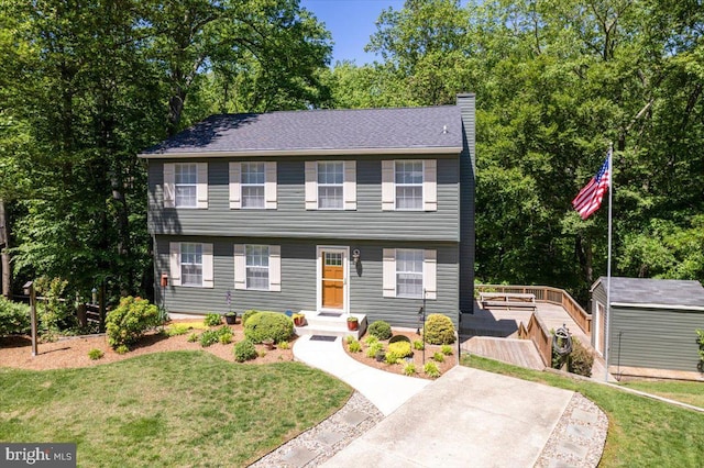 501 Macmillan Ct, Arnold, MD 21012 - colonial inspired home featuring a front yard and a chimney