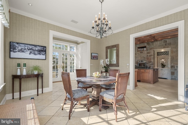 dining area with french doors, wallpapered walls, light tile patterned floors, a chandelier, and ornamental molding