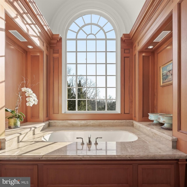 bathroom featuring a bath