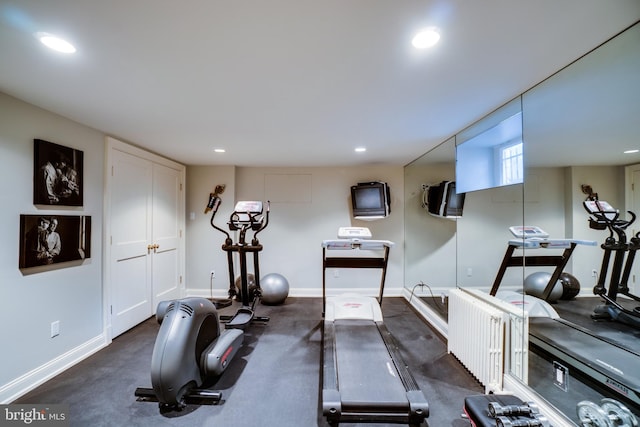 workout area with baseboards and recessed lighting