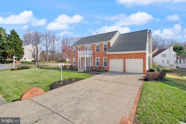 10 Sarasota Dr, Stafford, VA 22554 - view of front of property featuring brick siding, a front lawn, a garage, and concrete driveway