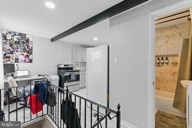 4508 Post Rd, Marcus Hook, PA 19061 - kitchen featuring stainless steel electric range oven, recessed lighting, a desk, freestanding refrigerator, and white cabinetry