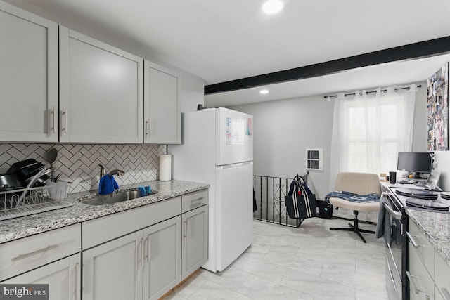 4508 Post Rd, Marcus Hook, PA 19061 - kitchen with electric stove, a sink, backsplash, recessed lighting, and light stone counters