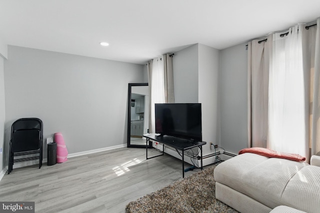 4508 Post Rd, Marcus Hook, PA 19061 - living room with light wood-style flooring, baseboards, and recessed lighting