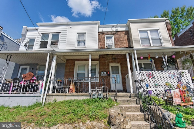 4508 Post Rd, Marcus Hook, PA 19061 - view of property with brick siding and covered porch