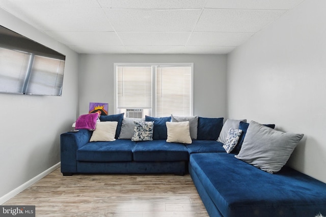 4508 Post Rd, Marcus Hook, PA 19061 - living area with wood finished floors, cooling unit, and baseboards