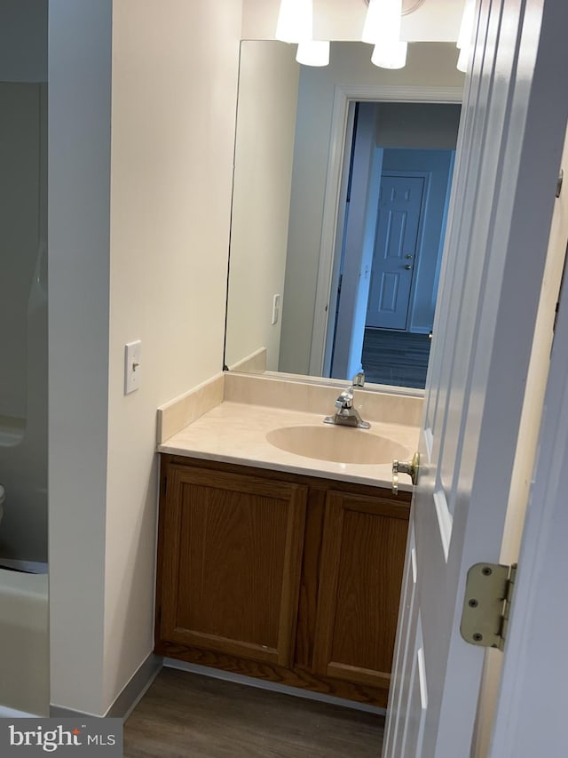 2002 Waters Edge Dr, Newark, DE 19702 - half bath featuring vanity and wood finished floors
