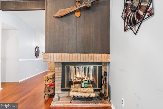 145 Arbor Meadow Dr, Sicklerville, NJ 08081 - detailed view of a fireplace, wood finished floors, and baseboards