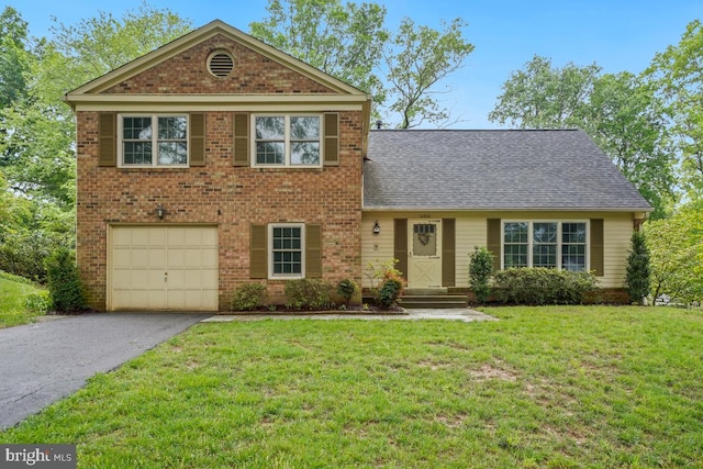 10620 Seneca Ridge Dr, Gaithersburg, MD 20886 - view of front facade with an attached garage, asphalt driveway, a front yard, a shingled roof, and brick siding
