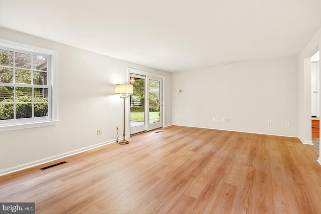 10620 Seneca Ridge Dr, Gaithersburg, MD 20886 - spare room with light wood-style floors and baseboards